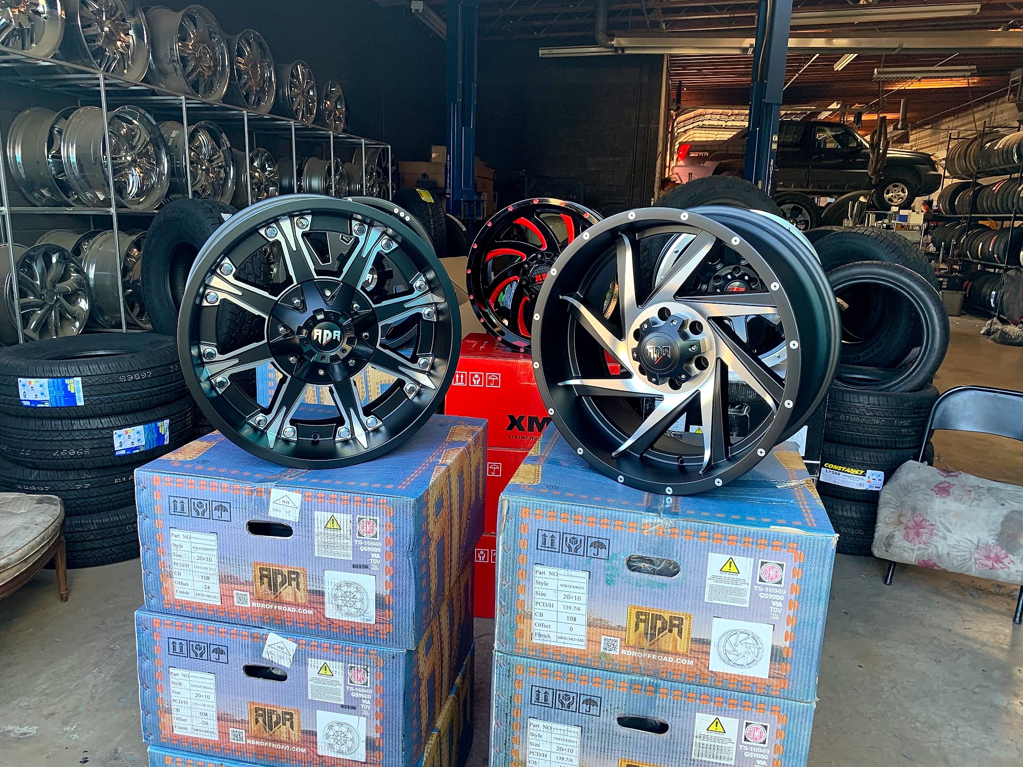 New wheels on their boxes inside the shop