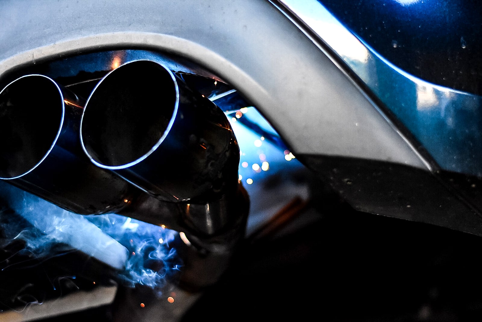 Dual exhaust tips with a blue heat tint