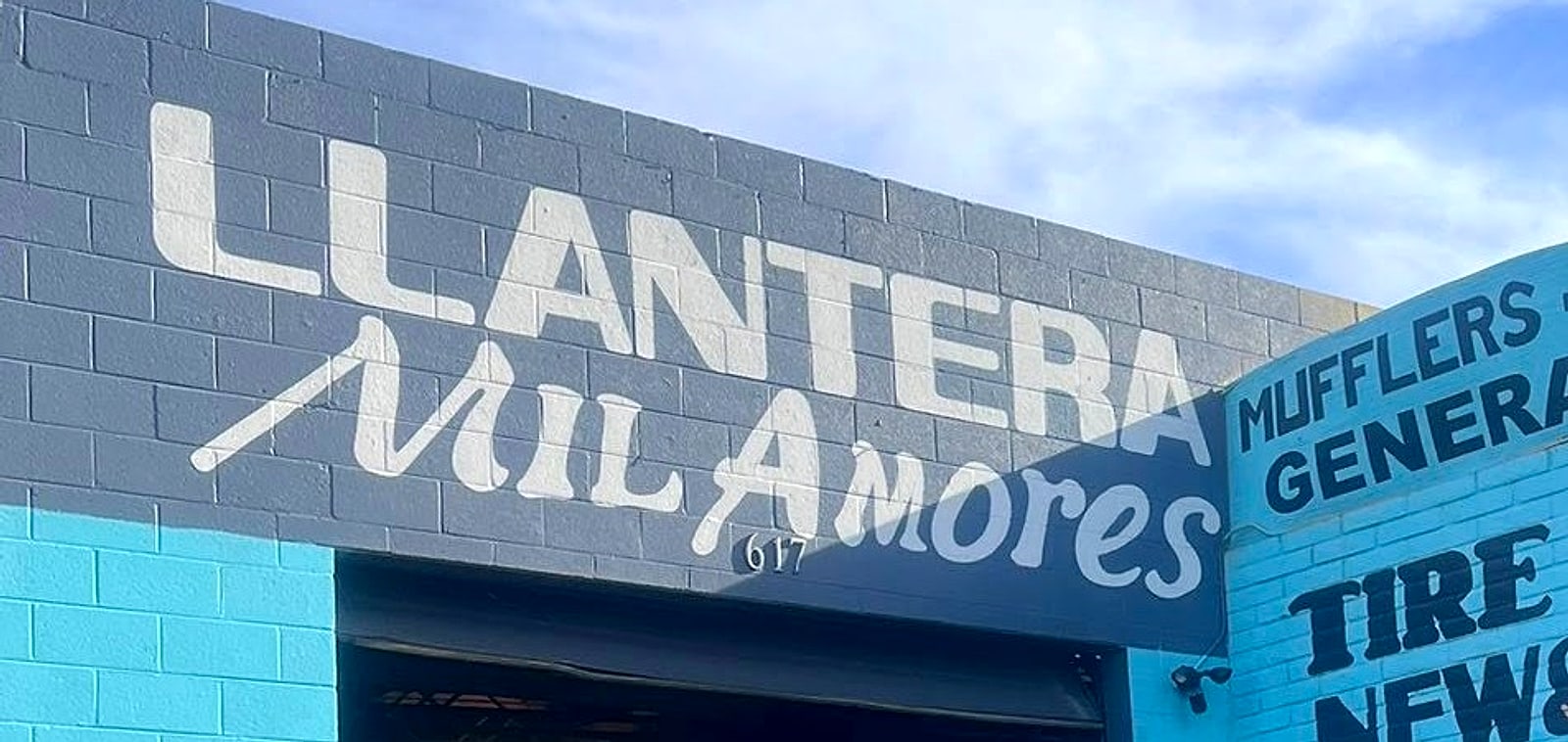 Llantera Mil Amores hand-painted on the slate block at 617 E Chandler Blvd